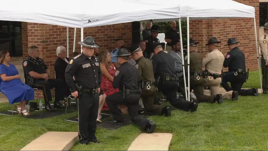 Flags presented to families of fallen police officers