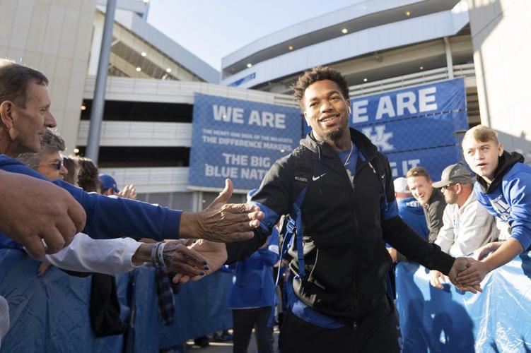 Kentucky wide receiver Lynn Bowden Jr. (1) greets fans