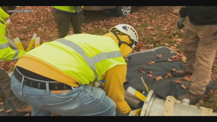 Louisville Water crews insert swimming robot into water main