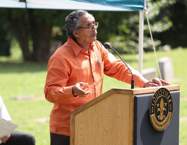 Dr. Wayne Tuckson speaks at a ceremony honoring Felton Snow