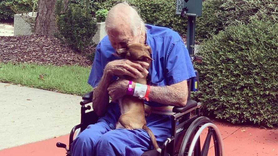 Rudy Armstrong with dog that saved his life