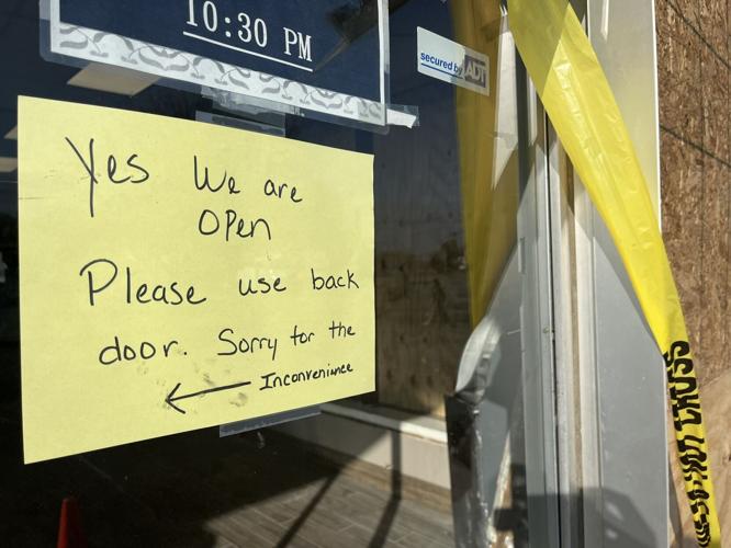 The Laundry Connection laundromat on Southgate Avenue, with damage and crime scene tape