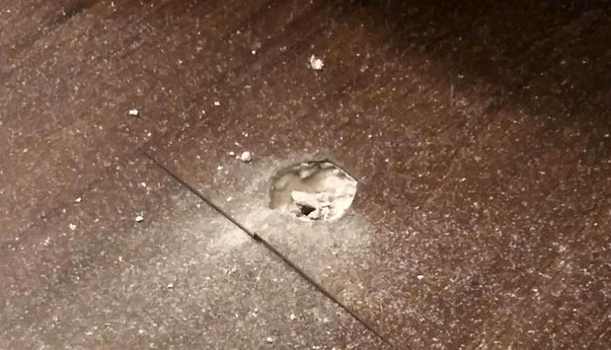 Bullet hole after student accidentally fires gun in U of L's Cardinal Towne apartments (Nov. 2019)