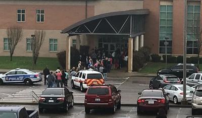 Man shot and killed by officers outside John Hardin High School