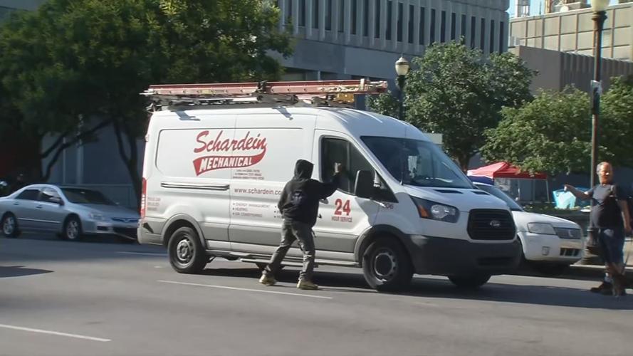 Downtown Protester Near Service Truck