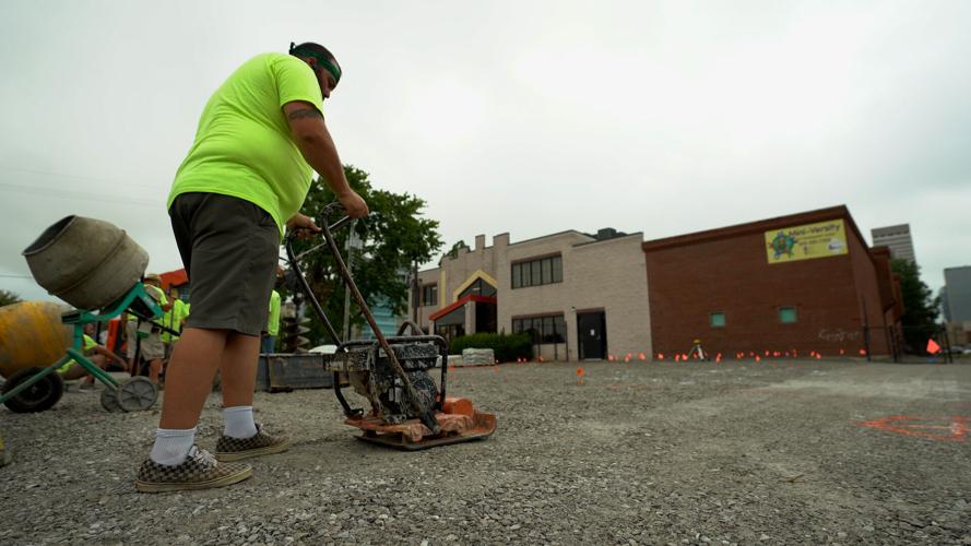 Volunteers build a new playground in Louisville's Russell neighborhood (Sept. 6, 2022)