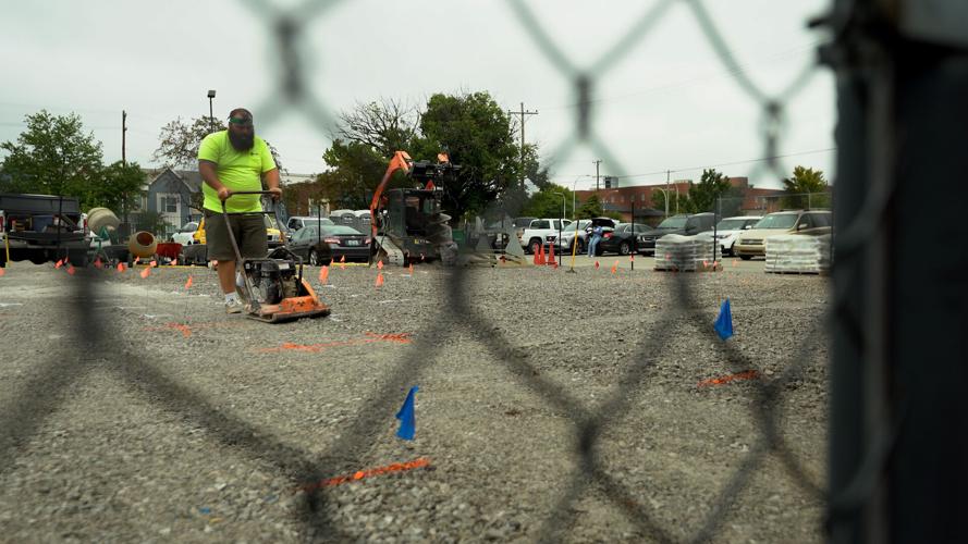 Volunteers build a new playground in Louisville's Russell neighborhood (Sept. 6, 2022)
