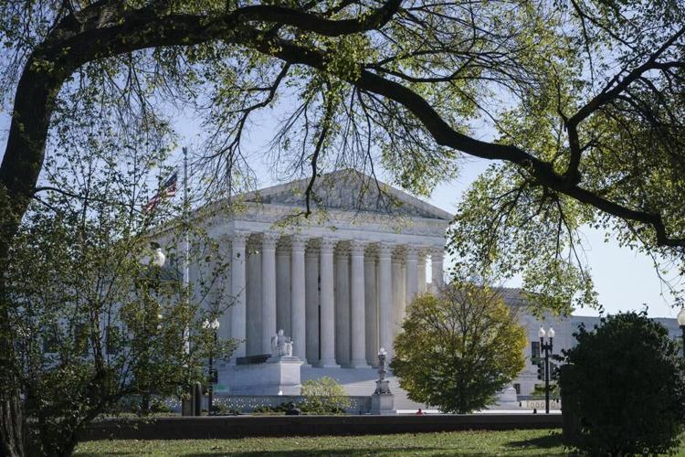US Supreme Court visible through trees