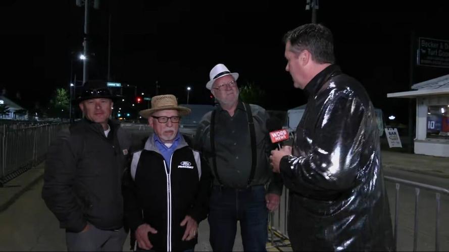 Keith Kaiser runs into some Hoosiers waiting to get into Churchill Downs