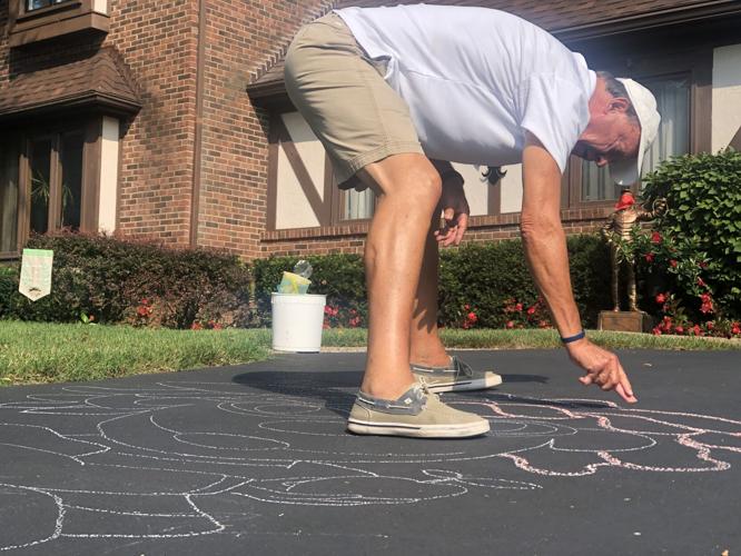 Bill Hall draws with chalk