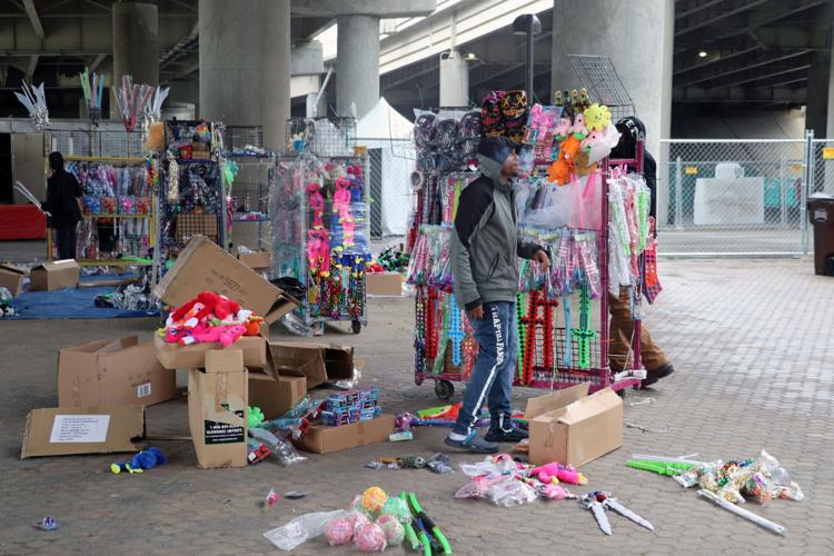 Crews set up booths along the Ohio River one day before Thunder Over Louisville 2023