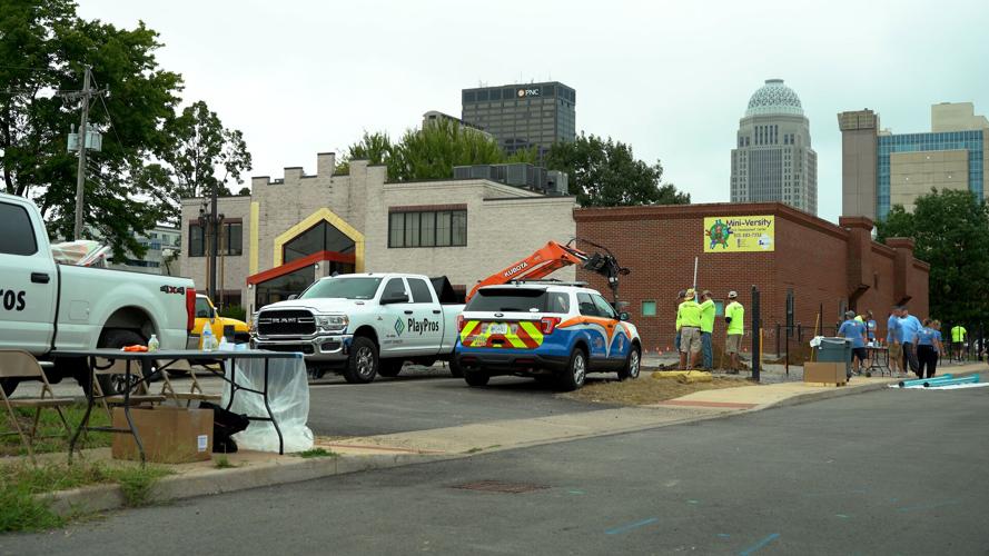 Volunteers build a new playground in Louisville's Russell neighborhood (Sept. 6, 2022)