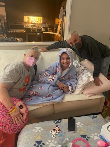 Alexis Bibb with family on sofa