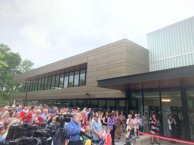 Crowd gathers at St. Matthews Eline Library grand reopening