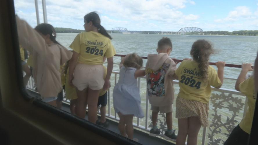 May M. Miller kids on boat