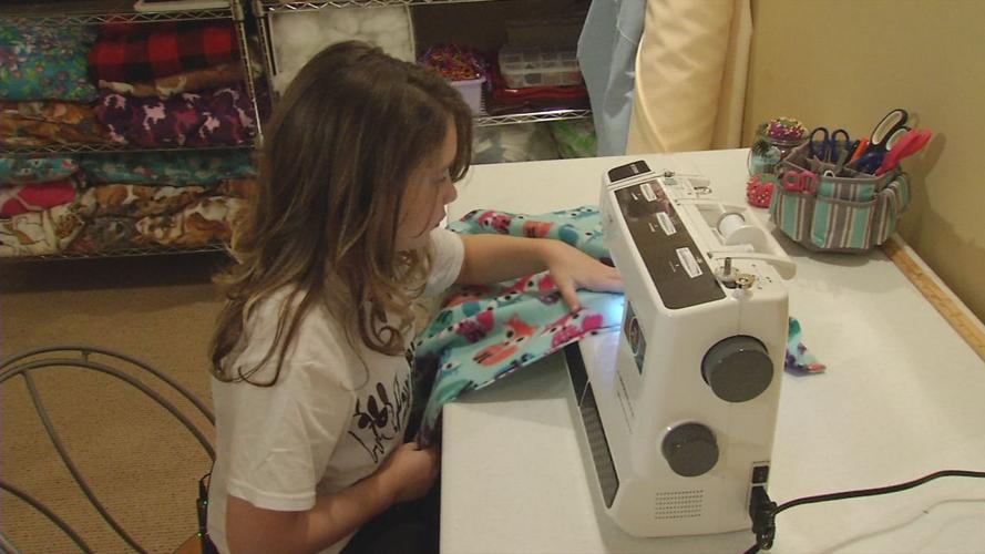 Louisville girl brings community together with dog beds