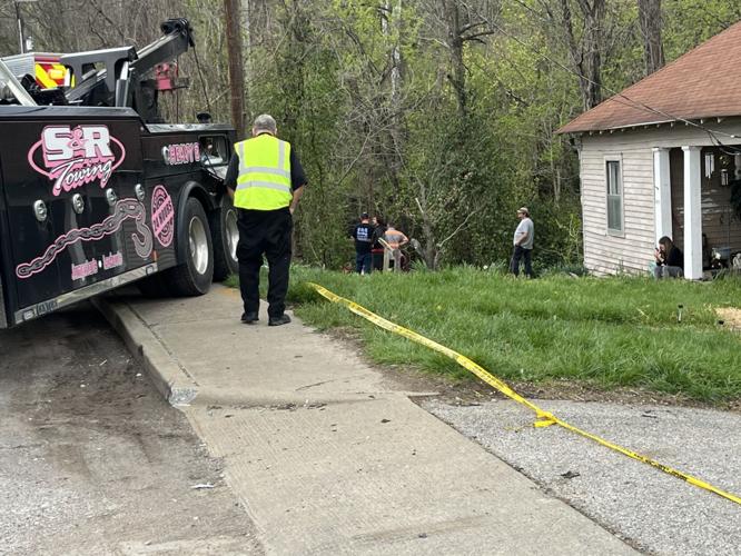 New Albany fire and police-car in the water 4-10-25
