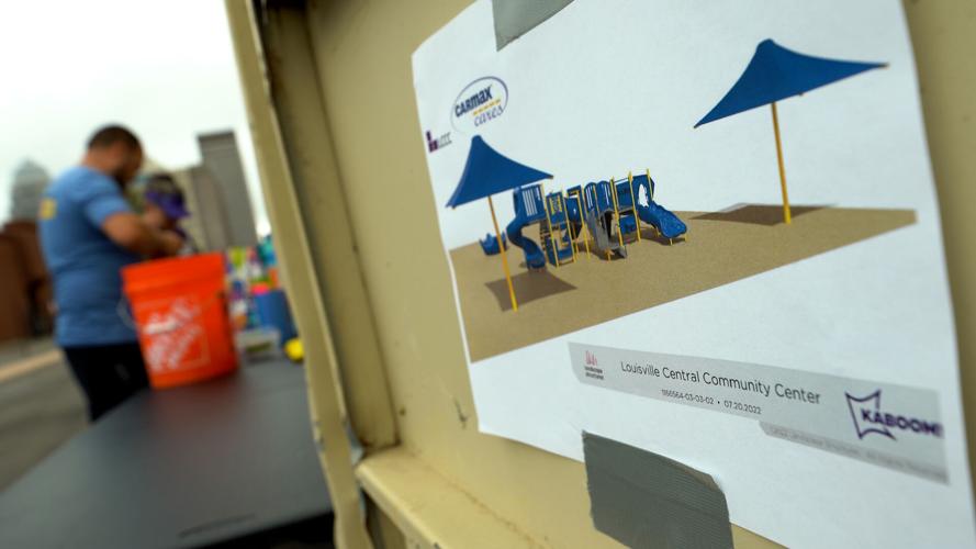 Volunteers build a new playground in Louisville's Russell neighborhood (Sept. 6, 2022)