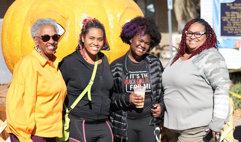 Harvest Homecoming - Group photo at pumpkin.JPG