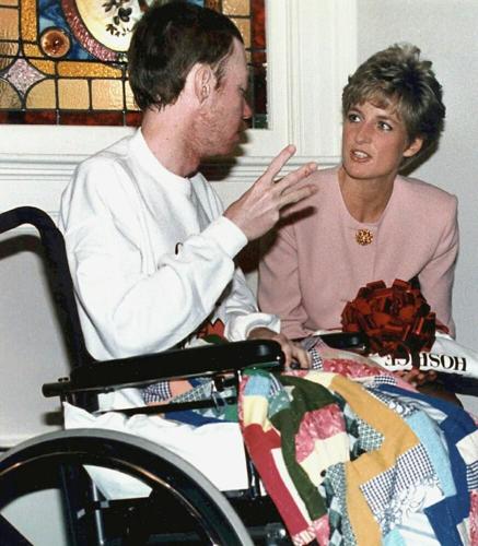 Princess Diana talks to AIDS patient