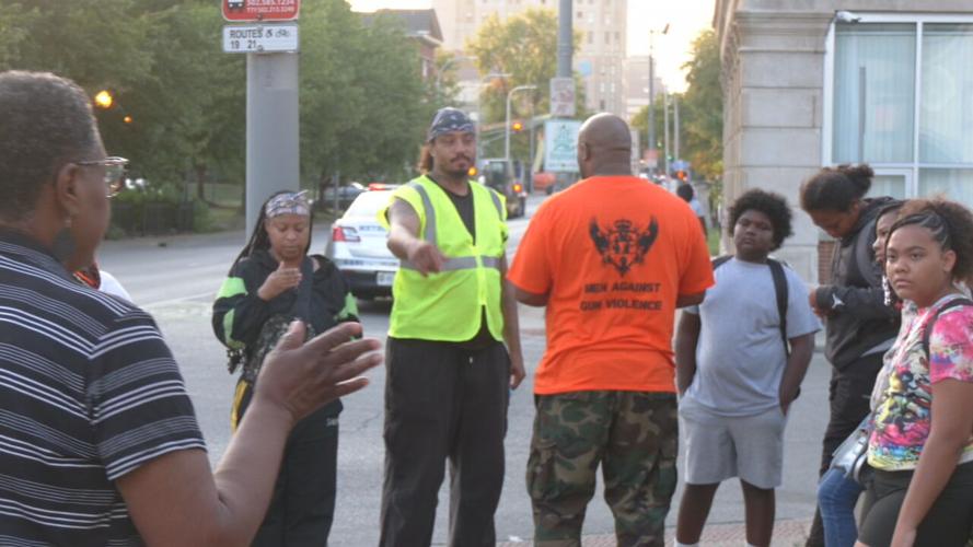 Men Against Gun Violence at west Louisville bus stop