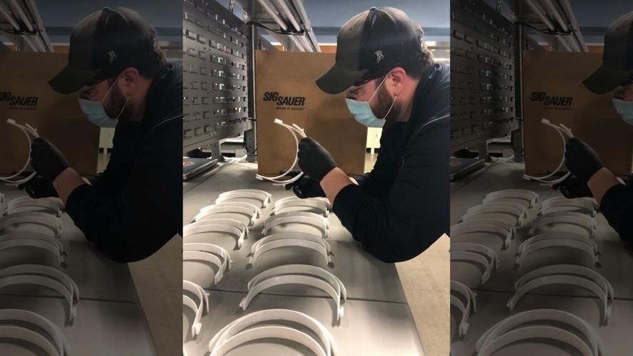 SIG Sauer worker making PPE