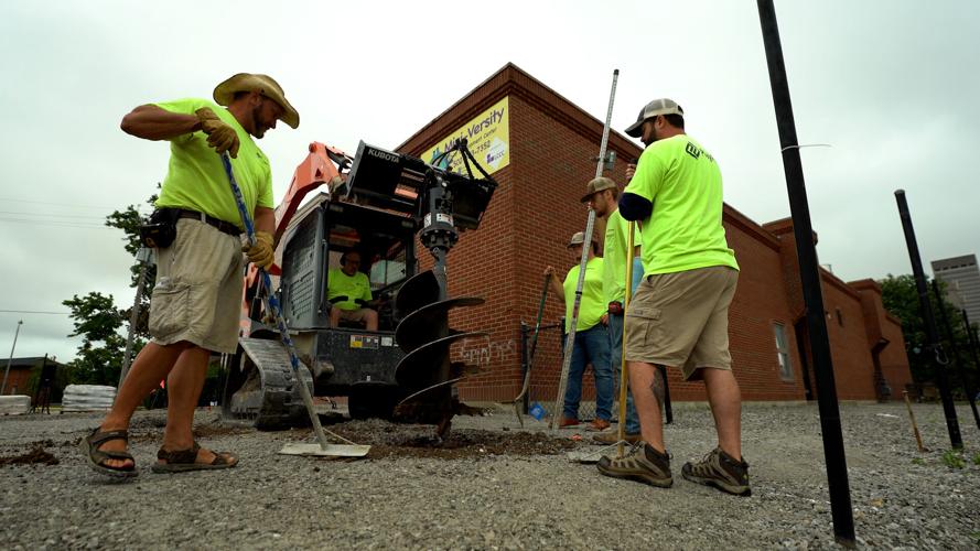 Volunteers build a new playground in Louisville's Russell neighborhood (Sept. 6, 2022)