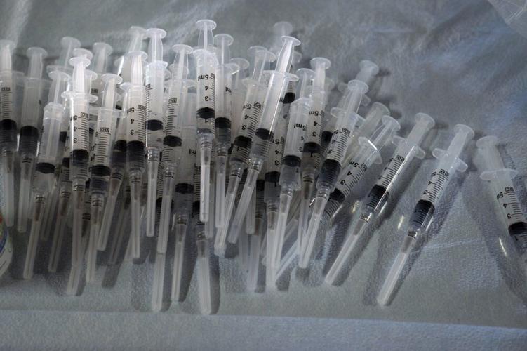 Pfizer COVID-19 vaccine syringes AP 2021.jpeg