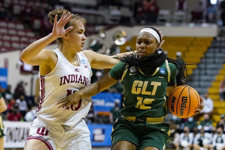 Charlotte guard Mikayla Boykin drives on Indiana forward Aleksa Gulbe.jpeg