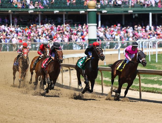 Horses race on Oaks Day