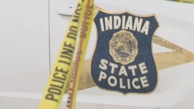 Indiana State Police car with crime tape