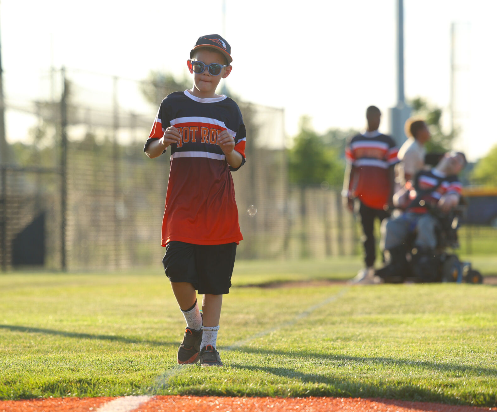 Clarksville Challenger player runs to home.JPG