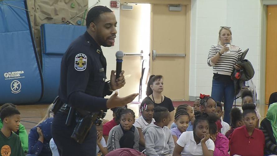 LMPD officer speaks to students at Byck Elementary School as part of Just Say Whoa campaign