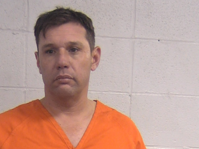 Vladimir Santos booking photo