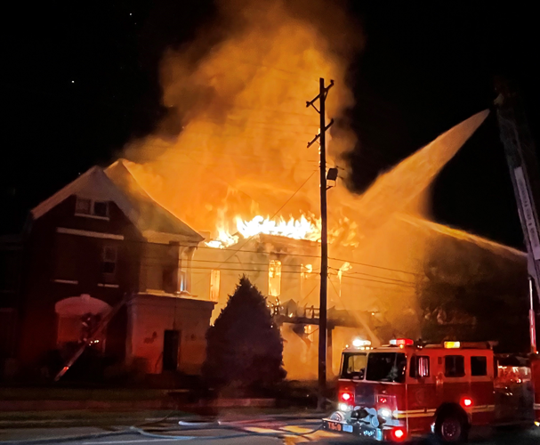 Firefighters battle flames on Logan Street