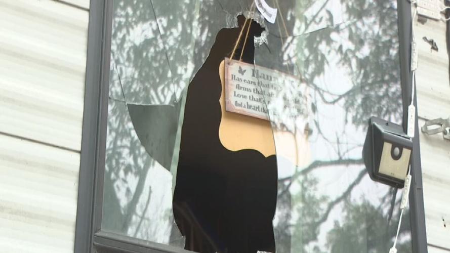 Russell County mobile home with broken windows