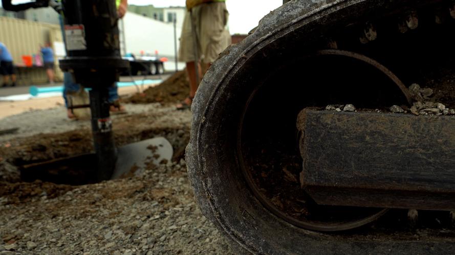 Volunteers build a new playground in Louisville's Russell neighborhood (Sept. 6, 2022)
