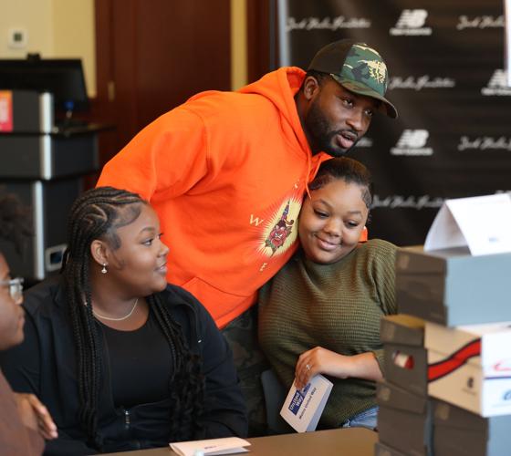 Girl hugs man at Jack Harlow event.JPG