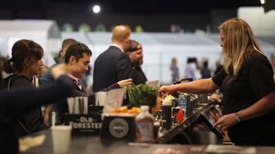 Race fans ate a bar at Churchill Downs