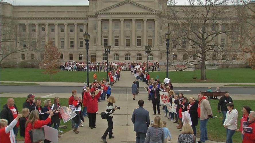 Kentucky teachers protest pension bill outside the state Capitol