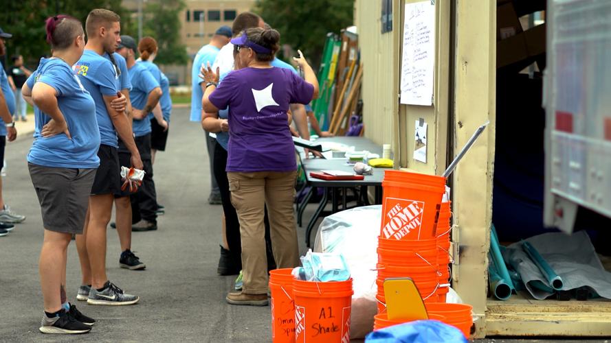 Volunteers build a new playground in Louisville's Russell neighborhood (Sept. 6, 2022)