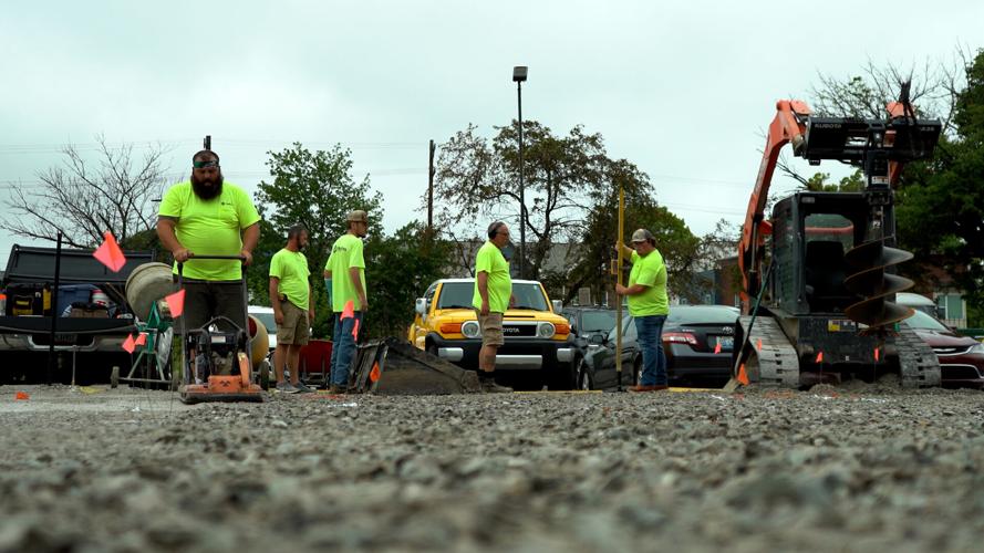 Volunteers build a new playground in Louisville's Russell neighborhood (Sept. 6, 2022)