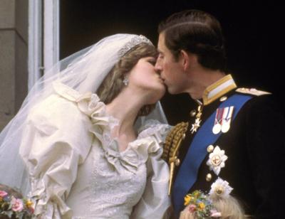 Prince Charles and Diana kiss after wedding