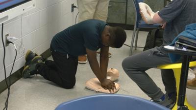 Ramsey student practices CPR