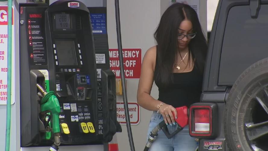Woman at gas pump