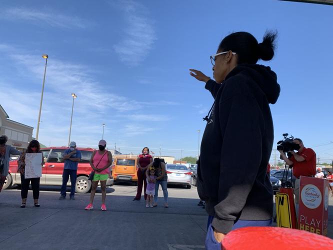 Faith leaders hold prayer service in the parking lot of looted Kroger