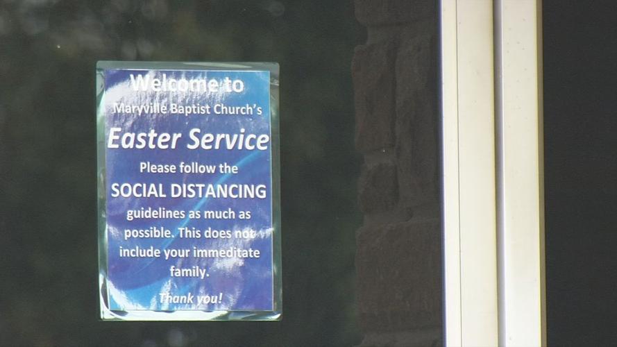 Sign to social distance at Maryville Baptist Church