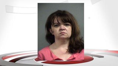 Woman accused of embezzling thousands from Bullitt County business arrested after attempting to use fraudulent check in Louisville