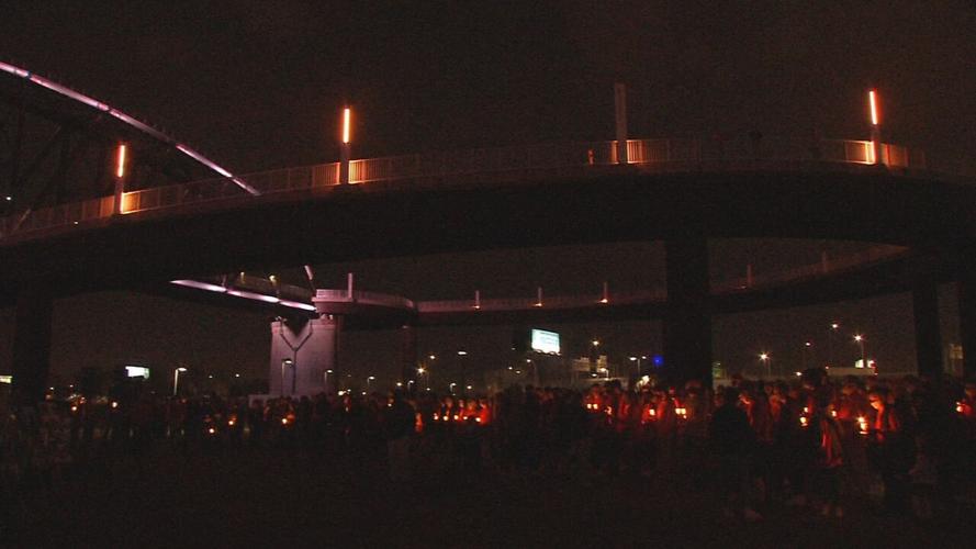People gather at the Big Four Bridge for Jake Stover vigil