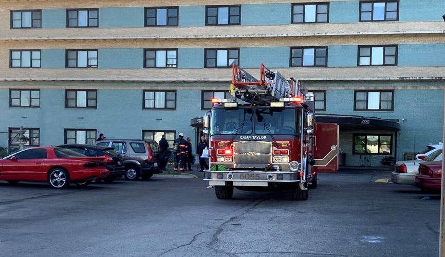 Firefighters at the scene of a fire at Brown Suburban Apartments on Bardstown Road